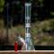 Chromatic UFO glass beaker bongs with down stem and cone piece.